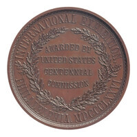 TMNK 03353
<br/>
Wereldtentoonstelling te Philadelphia 1876: prijspenning van de ‘International Exhibition’, toegekend aan de firma W.M. Logeman en Nikolaas van Wetteren te Haarlem
<br/>
<em>Verenigde Staten van Amerika, Republiek (1788-heden)</em>