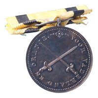 TMNK 05280
<br/>
Haagse vrijwilligers die bij de staatsomwenteling naar Woerden trokken, draagteken
<br/>
<em>Nederland, soeverein vorstendom (1813-1815)</em>